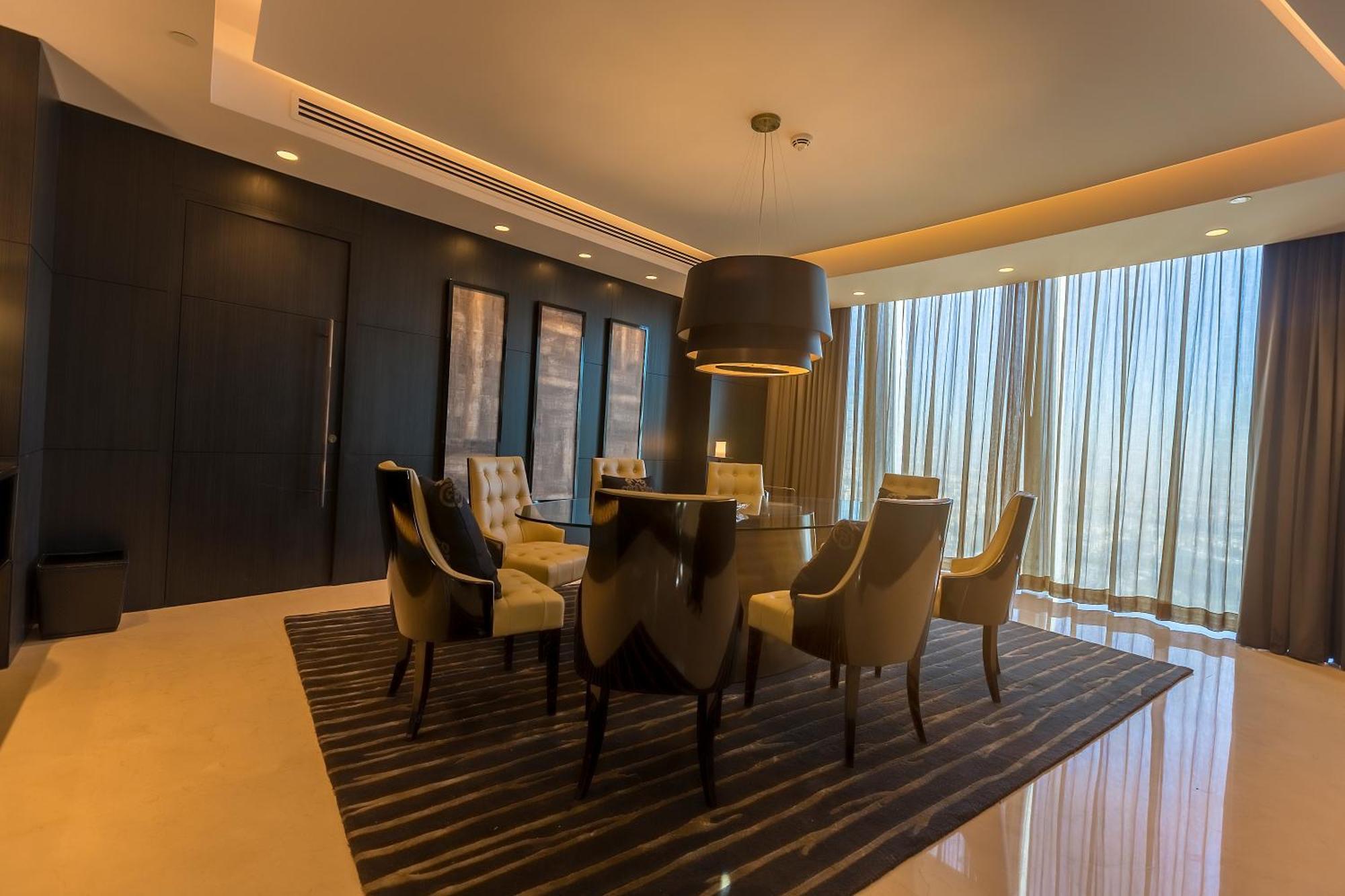 ホテル アンマン ロタナ エクステリア 写真 A dining room in a luxury apartment