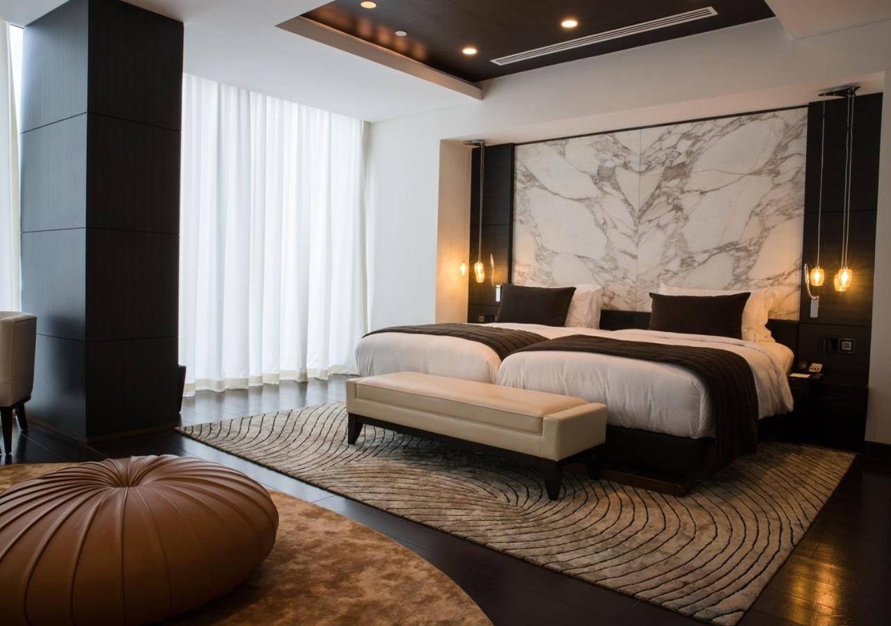 ホテル アンマン ロタナ エクステリア 写真 A bedroom at the hotel